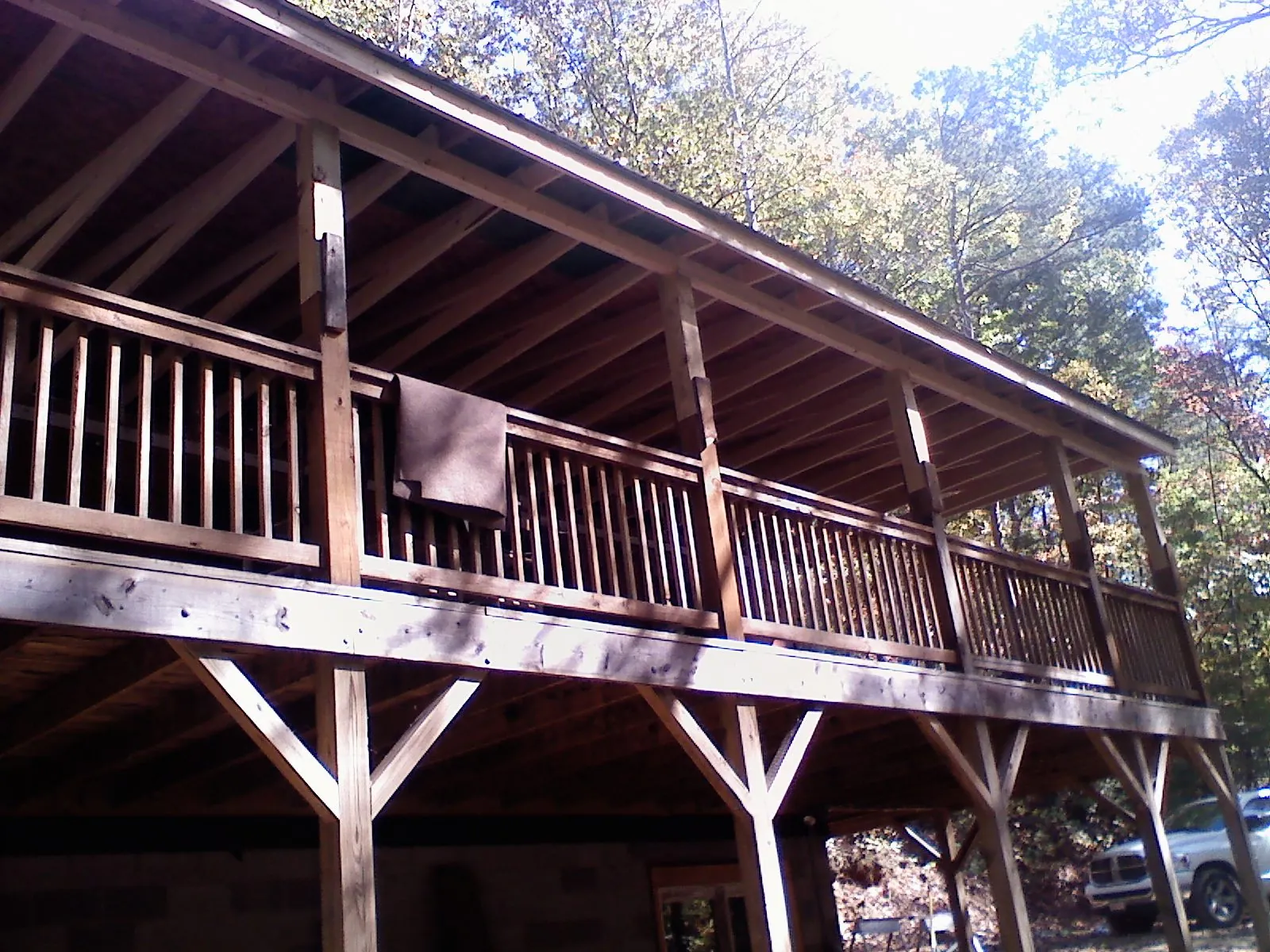 Timber framing under a new elevated porch and deck — Roof Leak Repair in Tyler Hill by Roofing Brothers